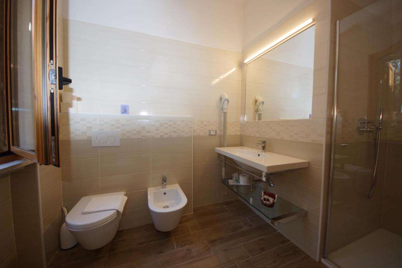 Hotel Alpi Мальчезине Экстерьер фото