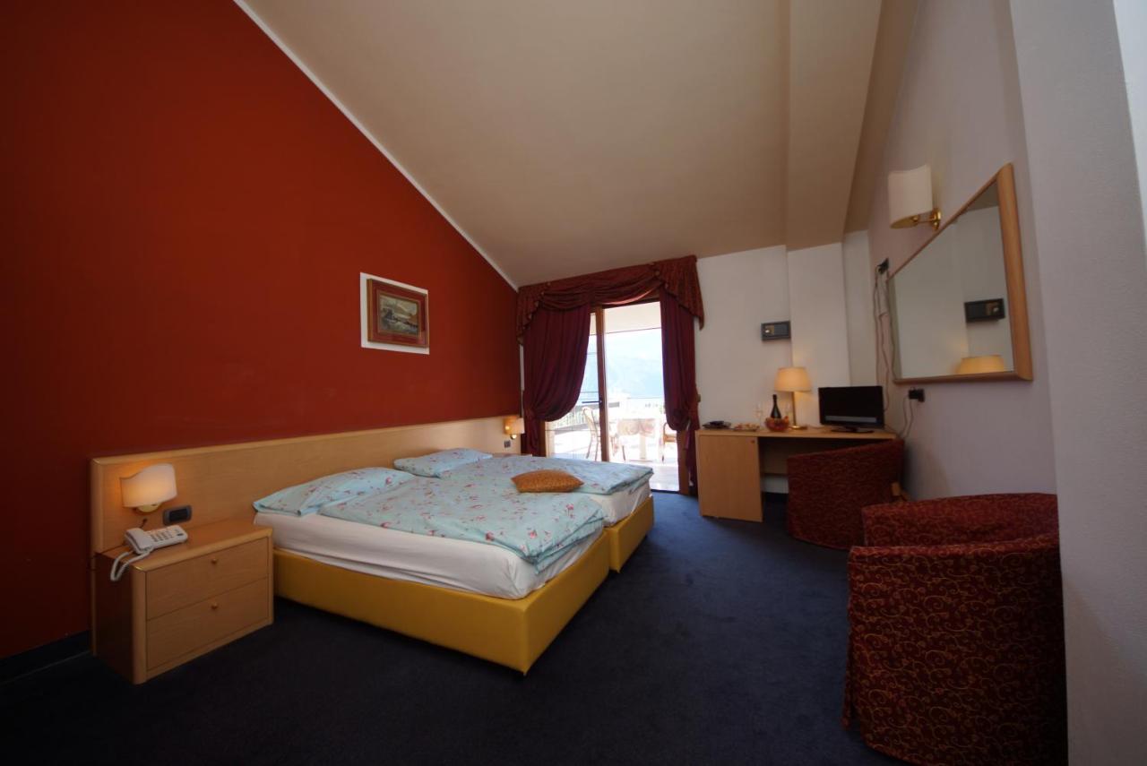Hotel Alpi Мальчезине Экстерьер фото