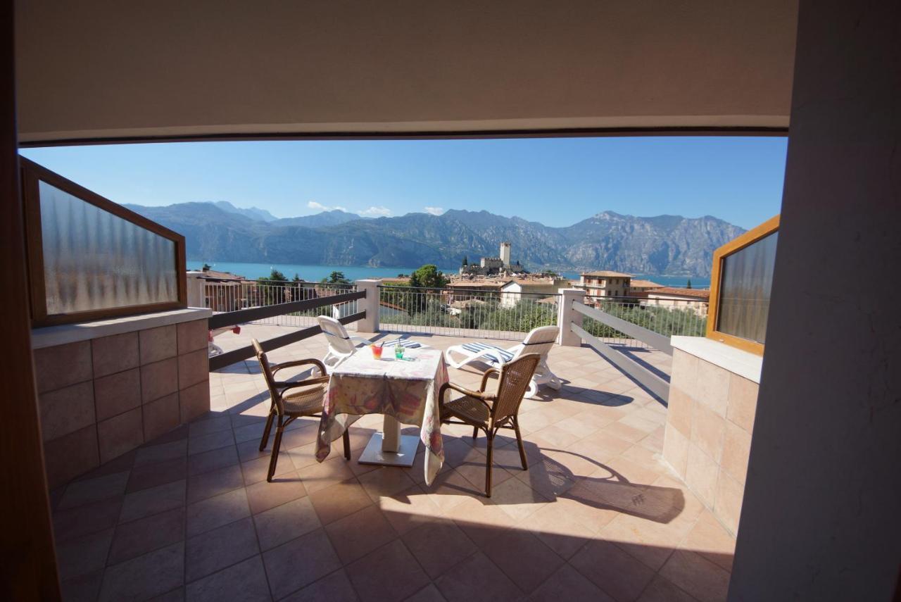 Hotel Alpi Мальчезине Экстерьер фото